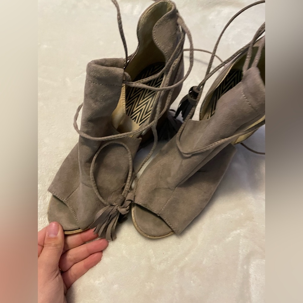 Heeled wrap up sandals